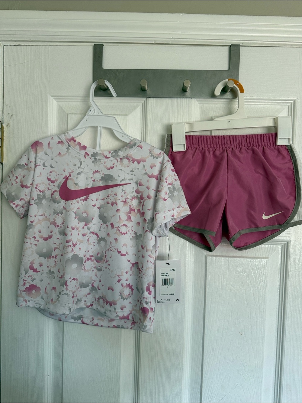 Nike Girls' size 6 Pink Floral Logo Tee and Dark Pink Trim Shorts Set